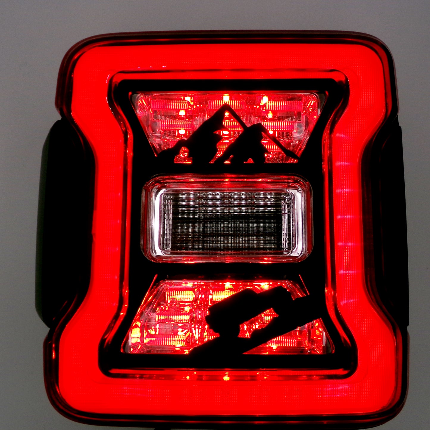 Jeep climbing mountain tail light covers