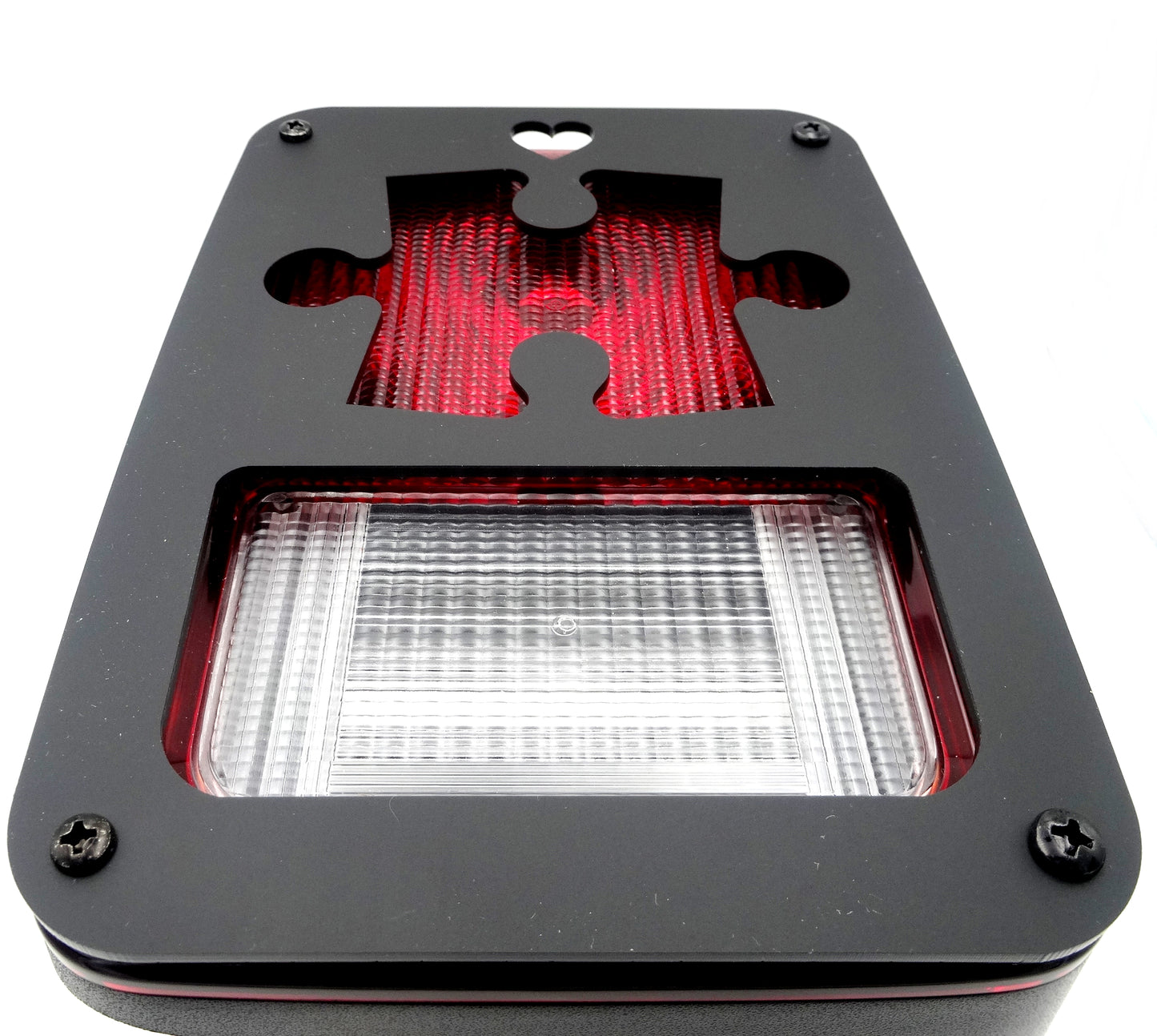 Autism puzzle piece brake light covers