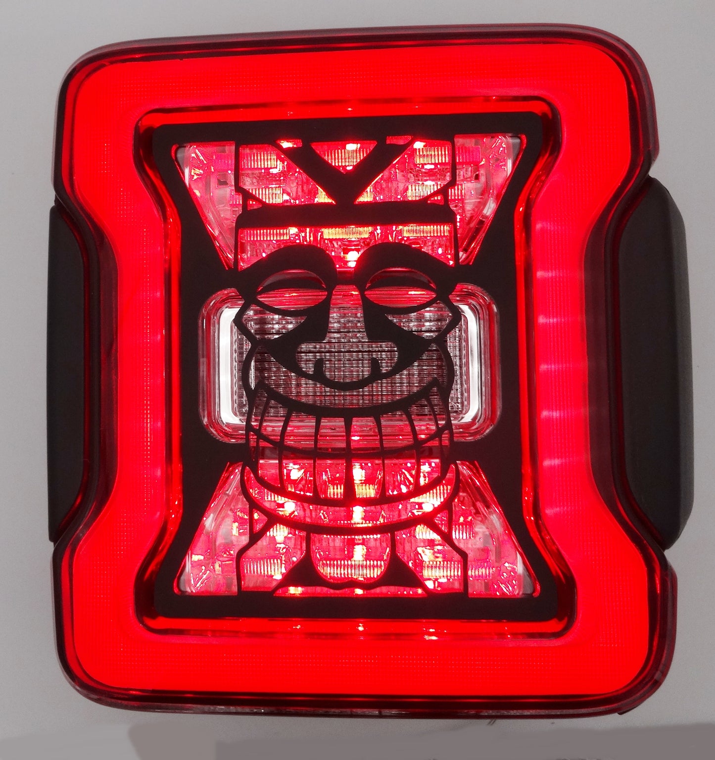 Tiki design brake light covers