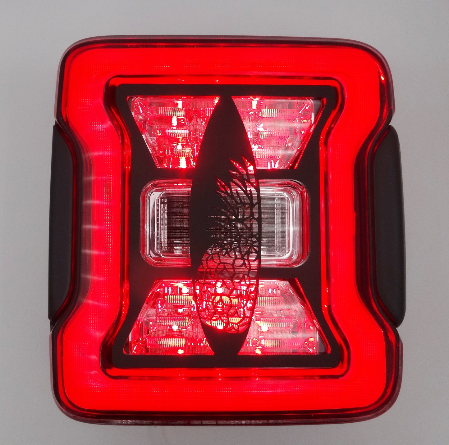 Surfboard with pinapple design brake light covers