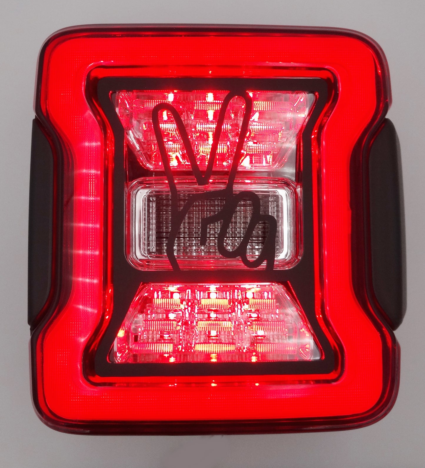 Hand wave / two finger design brake light cover