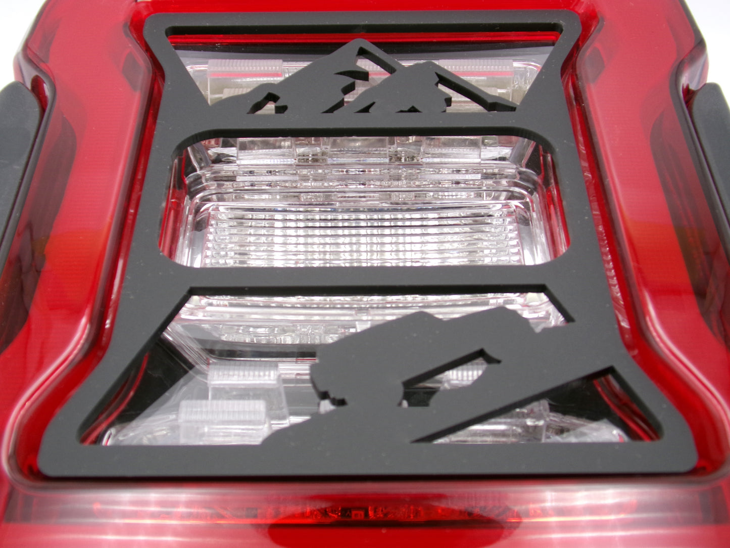 Jeep climbing mountain tail light covers