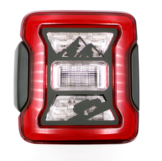 Jeep climbing mountain tail light covers