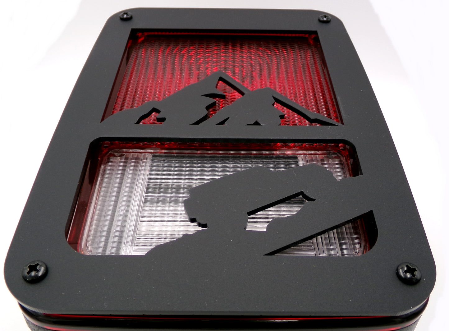 Jeep climbing mountain tail light covers